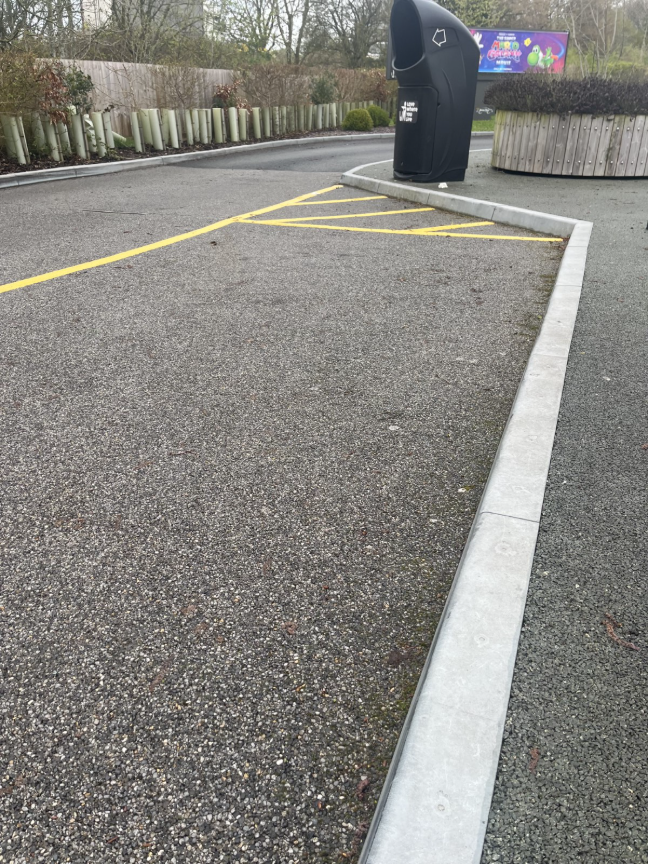 Wide view of Durakerb kerbing installed at McDonald’s Market Drayton car park and drive-thru area.